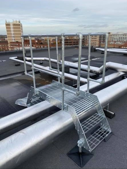 Roof stepover providing safety while navigating over obstacles, stainless steel design with anti-slip finish