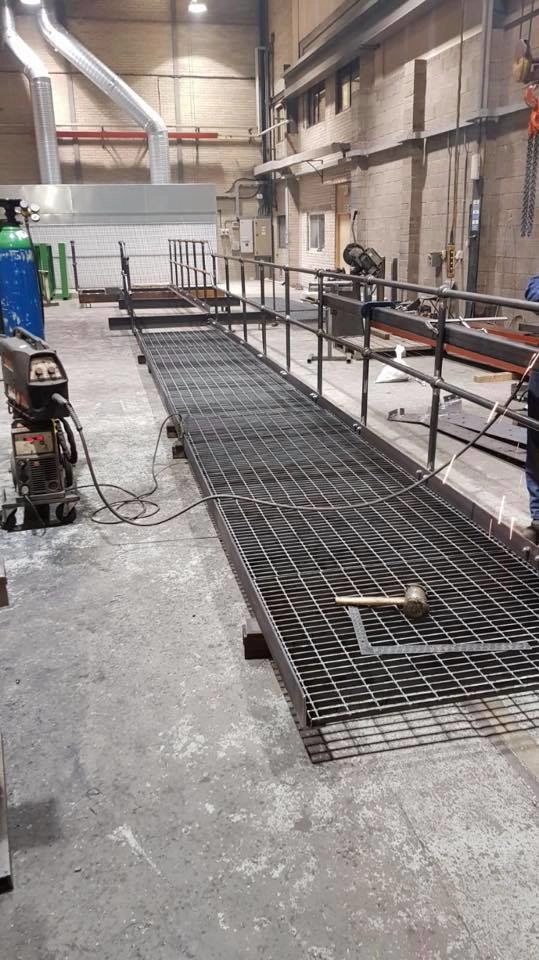 Fabricating industrial metal access walkways in our workshop