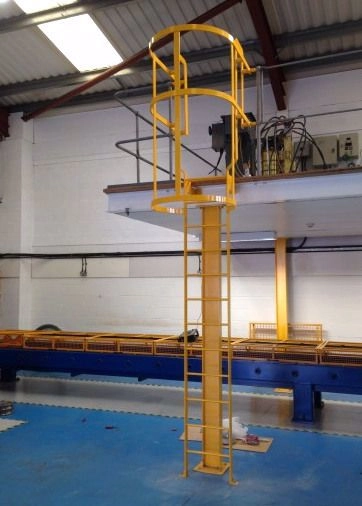Yellow companionway ladder allowing secure access to elevated platform